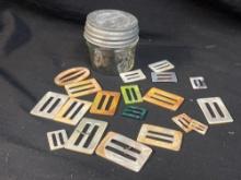 VINTAGE MOTHER OF PEARL buckles in jar with zinc lid