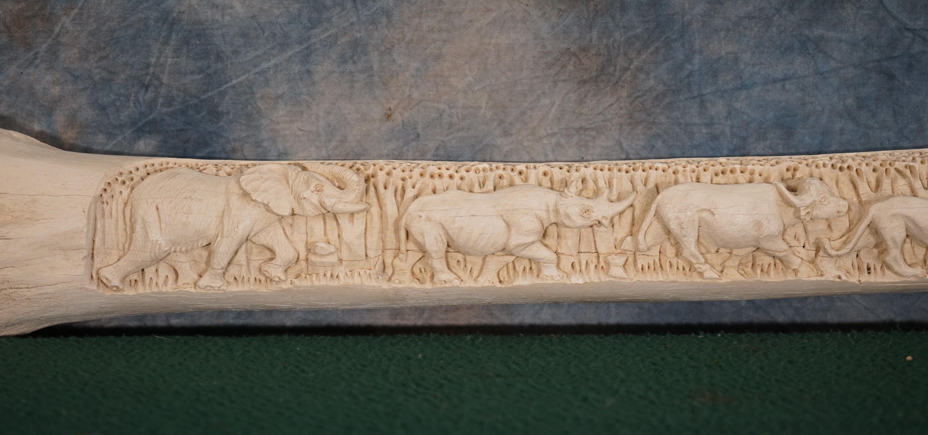 Giraffe Bone with African Big Five Game Animals Carved into it