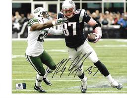 Rob Gronkowski New England Patriots Autographed 8x10 Stiff Arm vs Jets Photo w/GA coa