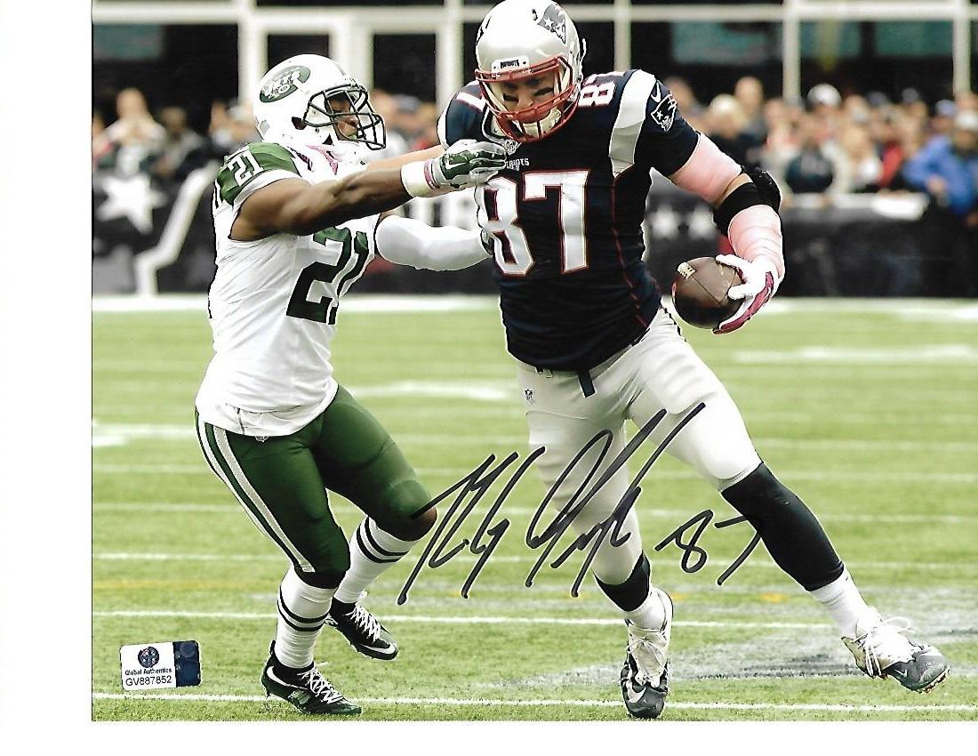 Rob Gronkowski New England Patriots Autographed 8x10 Stiff Arm vs Jets Photo w/GA coa