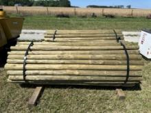 Bundle of wooden fence posts