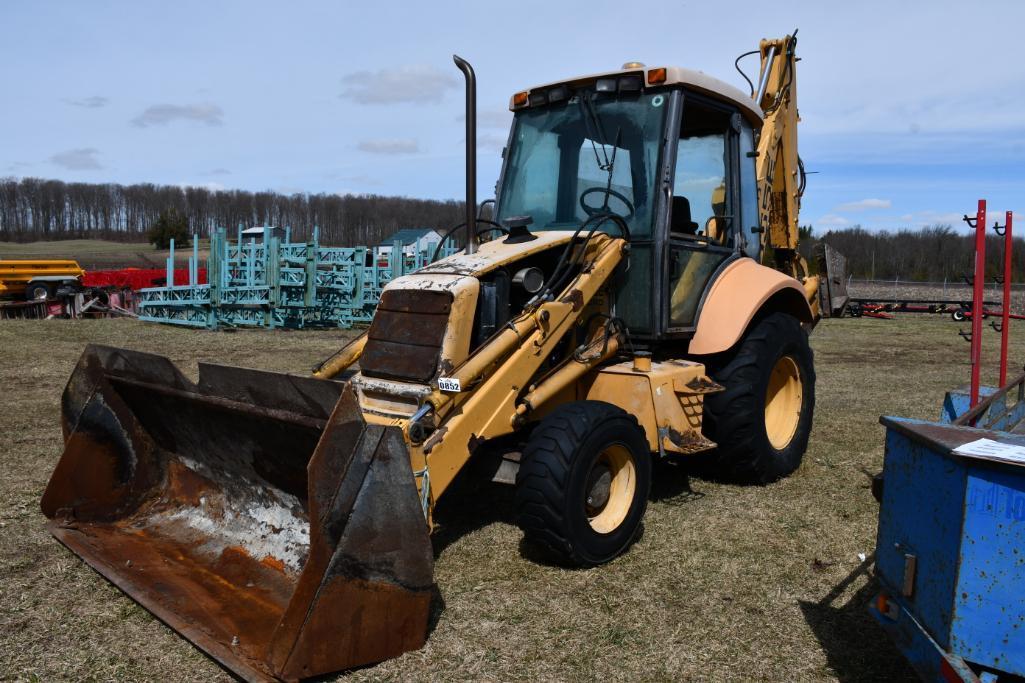 NEW HOLLAND 555E BACKHOE