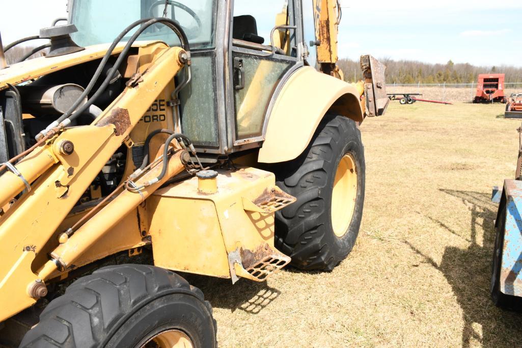 NEW HOLLAND 555E BACKHOE