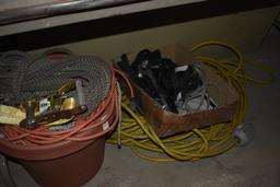 Big Yellow high voltage wire, barrel of misc extension cords, little hitch for a truck, and ratchet