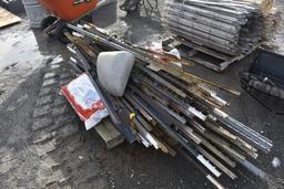pallet with 2 bags of salt, cast waterer, and approx 35 t-posts