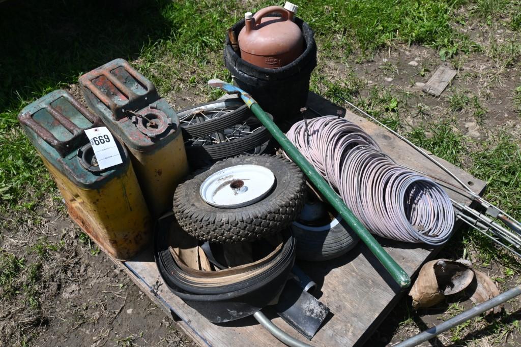 2 Gas Cans, Tires, Feed Buckets, Wire, Umbrella Frame