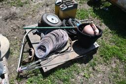 2 Gas Cans, Tires, Feed Buckets, Wire, Umbrella Frame