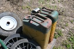 2 Gas Cans, Tires, Feed Buckets, Wire, Umbrella Frame