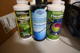 Seven One Quart Bottles of Hydroponic Chemicals
