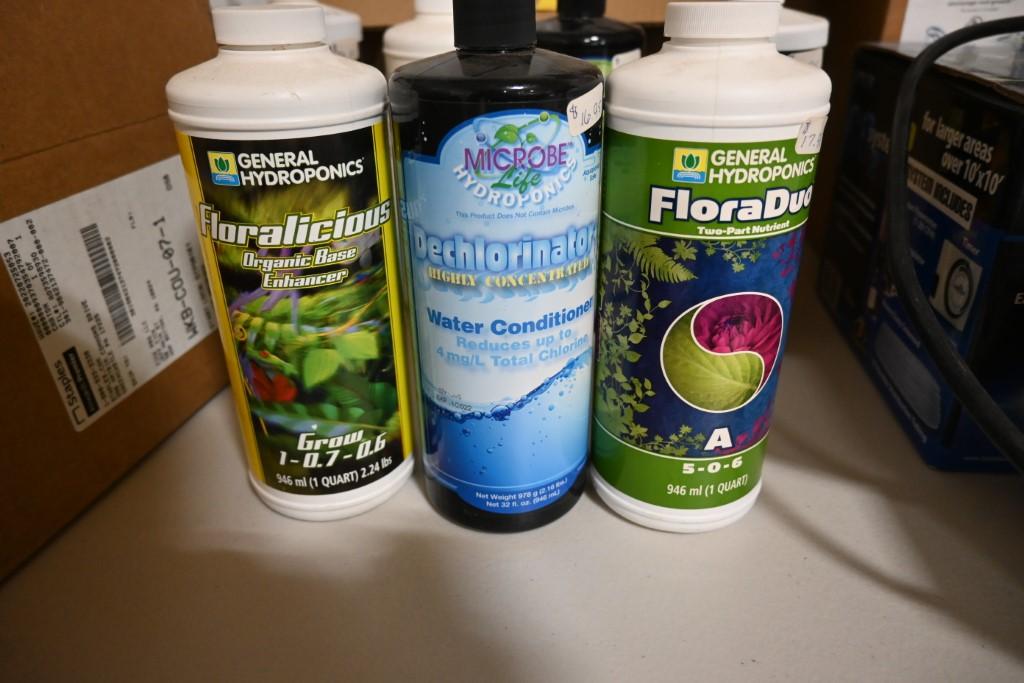 Seven One Quart Bottles of Hydroponic Chemicals