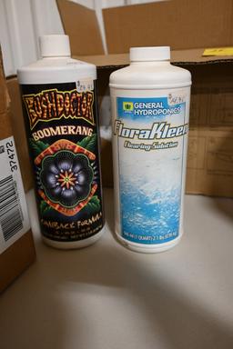 Seven One Quart Bottles of Hydroponic Chemicals
