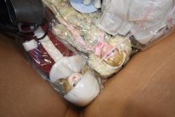 Box of Dolls and Knit Table Clothes
