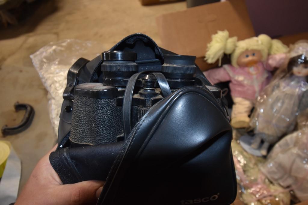 Box of Dolls and Knit Table Clothes
