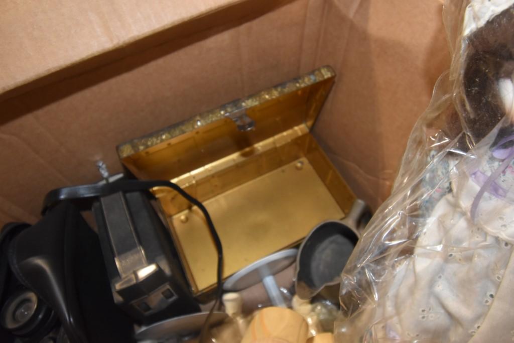 Box of Dolls and Knit Table Clothes