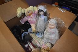 Box of Dolls and Knit Table Clothes