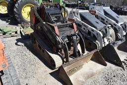 Toro Dingo TX-1000 Ride Behind Skid Steer