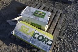 Roll of Sunfilm 25" Bale Wrap and Roll of SilaCord 30" Wrap