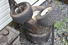 4 Carlisle Lawn Tractor Tires and Piece of Lawn Tractor Axle