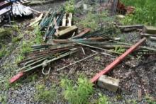 Group of Metal t-Post, Rebar, Red Metal Posts and Some Metal Paneling