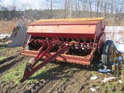 Minneapolis moline grain drill with double disc with grass seed