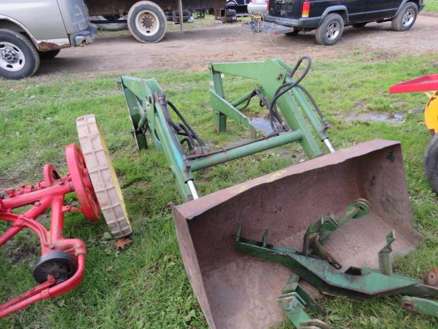 JD 67 loader with bracket