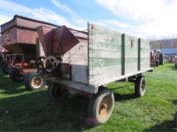 HYDRAULIC DUMP WAGON WITH MCCORMICK SEEDER ON BACK