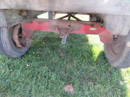 HYDRAULIC DUMP WAGON WITH MCCORMICK SEEDER ON BACK