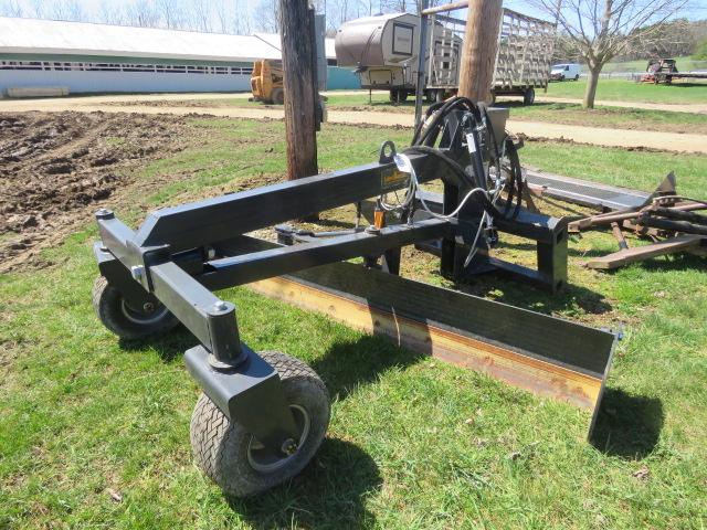 GRADER ATTACHMENT FOR A SKIDSTEER