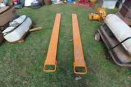 SET OF ORANGE 7FT PALLET FORK EXTENSIONS