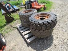 4 10-16.5 SKIDSTEER TIRES ON RIMS USED