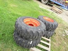 4 NEW GLADIATOR 12-16.5 SKIDSTEER TIRES ON BOBCAT