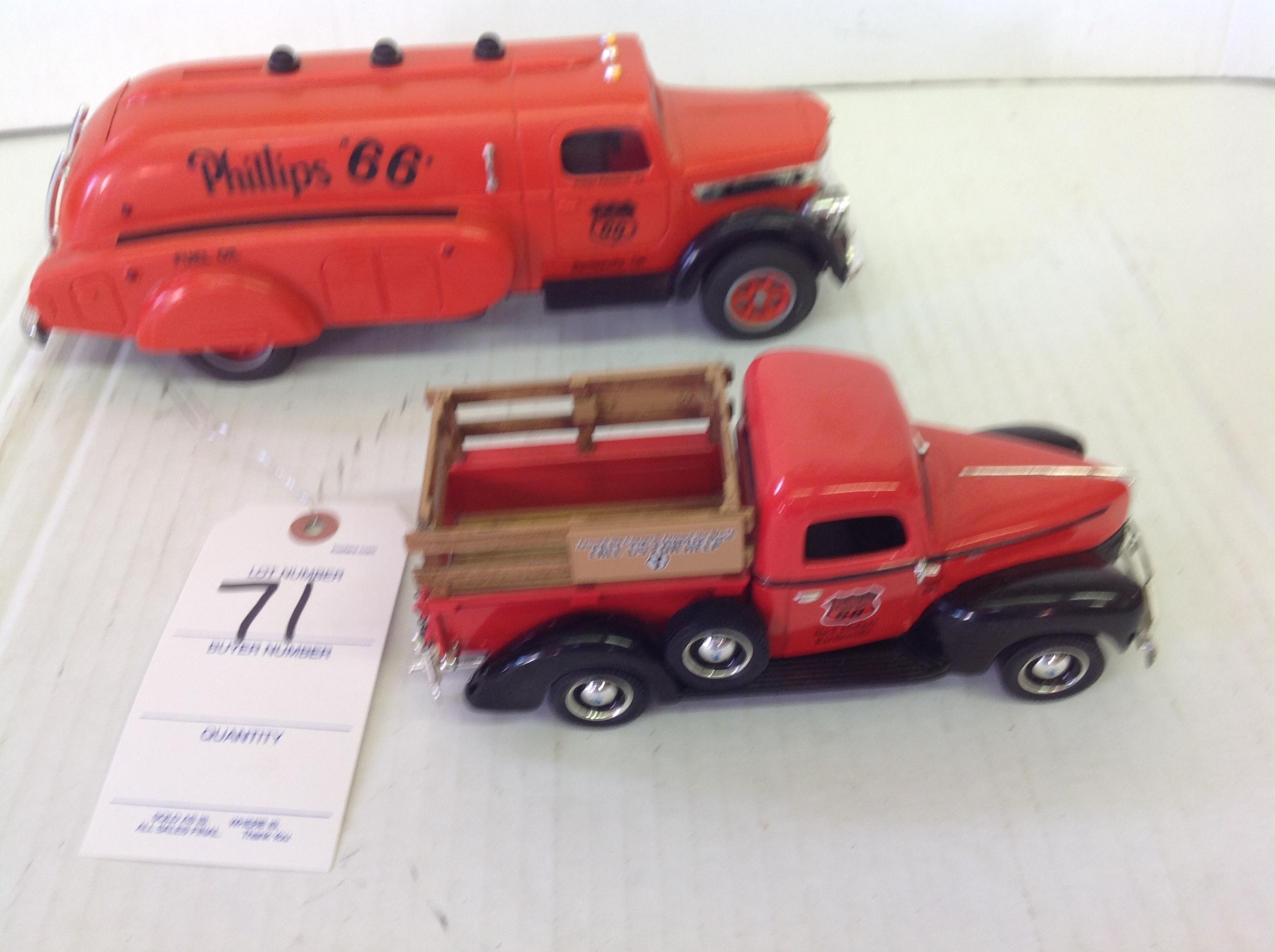 2 Phillips 66 trucks 1 IH and 1 1940 Ford