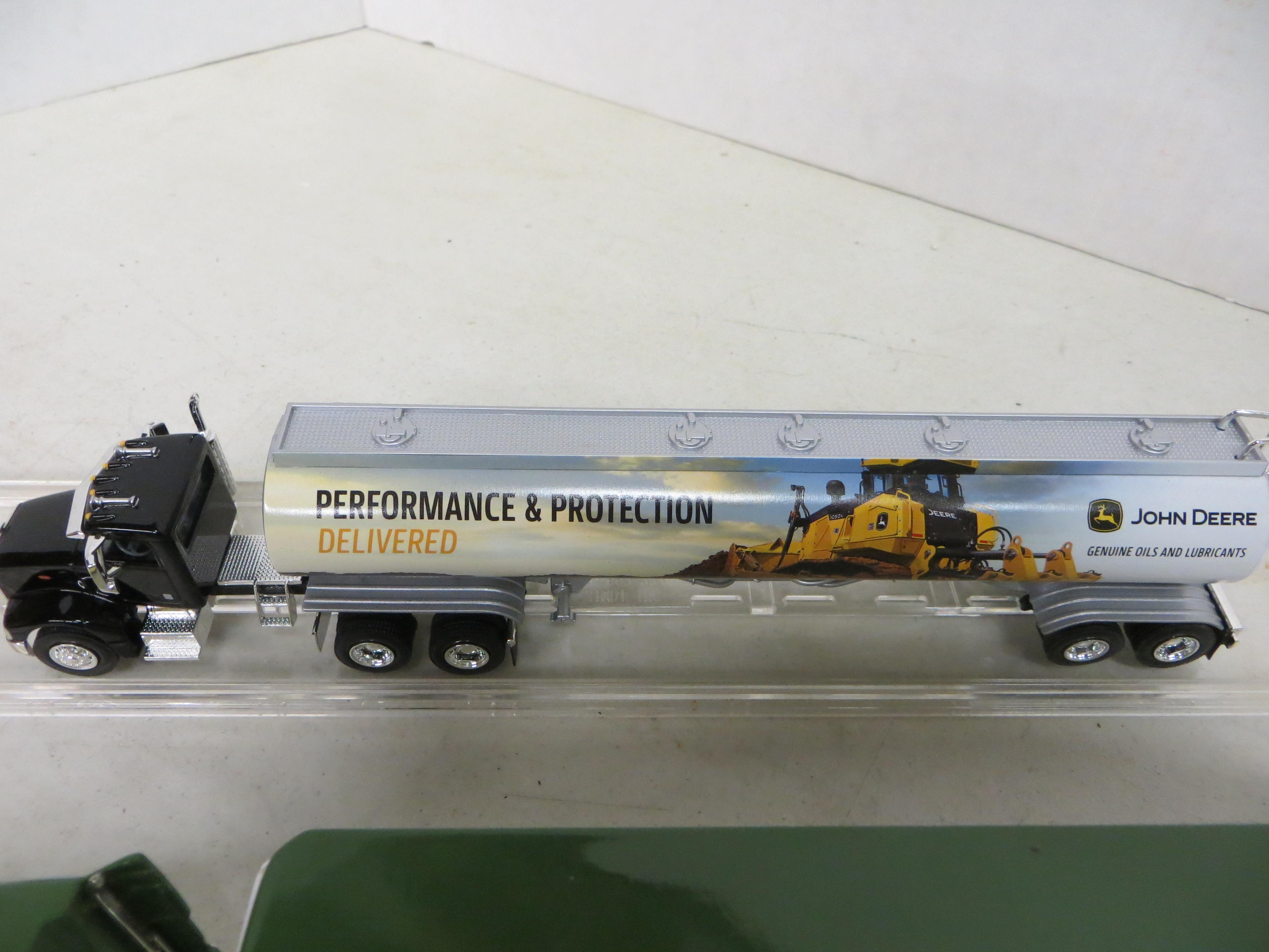 2 John Deere Semi's w/case's, van trailer missing door