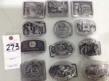 Collection of John Deere belt buckles, putter