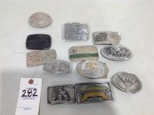 assortment of John Deere belt buckles, and money holder