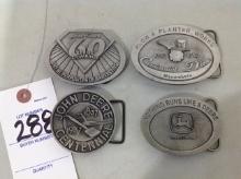 assortment of John Deere belt buckles