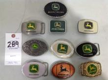 assortment of John Deere belt buckles