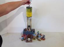 Lowell Trivis figurines, John Deere golf ball, John Deere wind chime