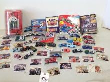 assortment of matchbox, hot wheel, racing champion cars, also some trading cards
