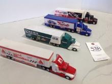 4 racing transporters semi's
