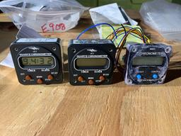 CLOCKS (1) AT420100 (NEW), (1) LC-2 (TESTED), (1) M800-28V-BAT (NEEDS REPAIR)