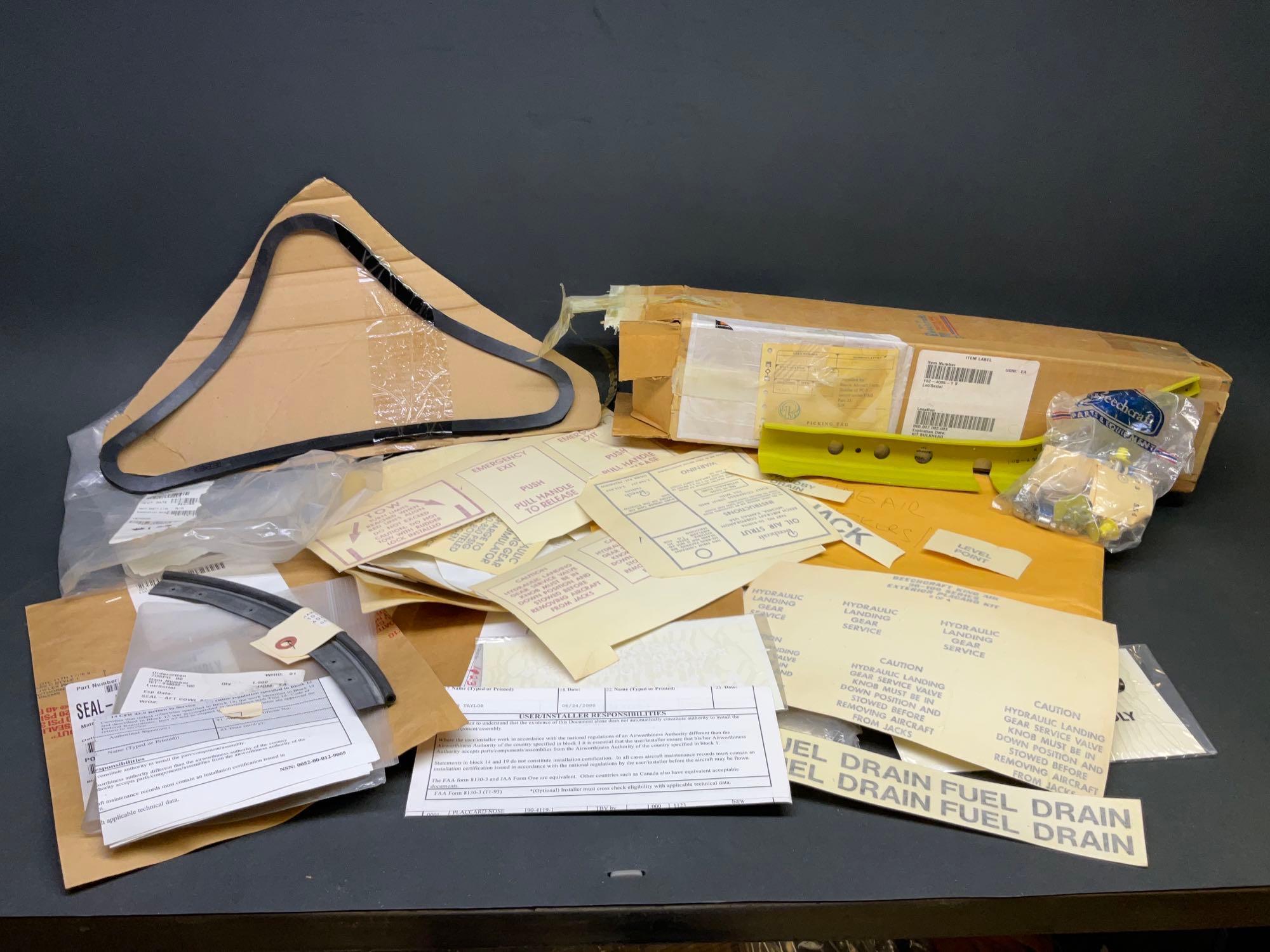NEW KING AIR WING WINDOW SEAL 101-420126-1, COWL SEAL 101-910049-100, PLACARDS AND P-BARON BULKHEAD