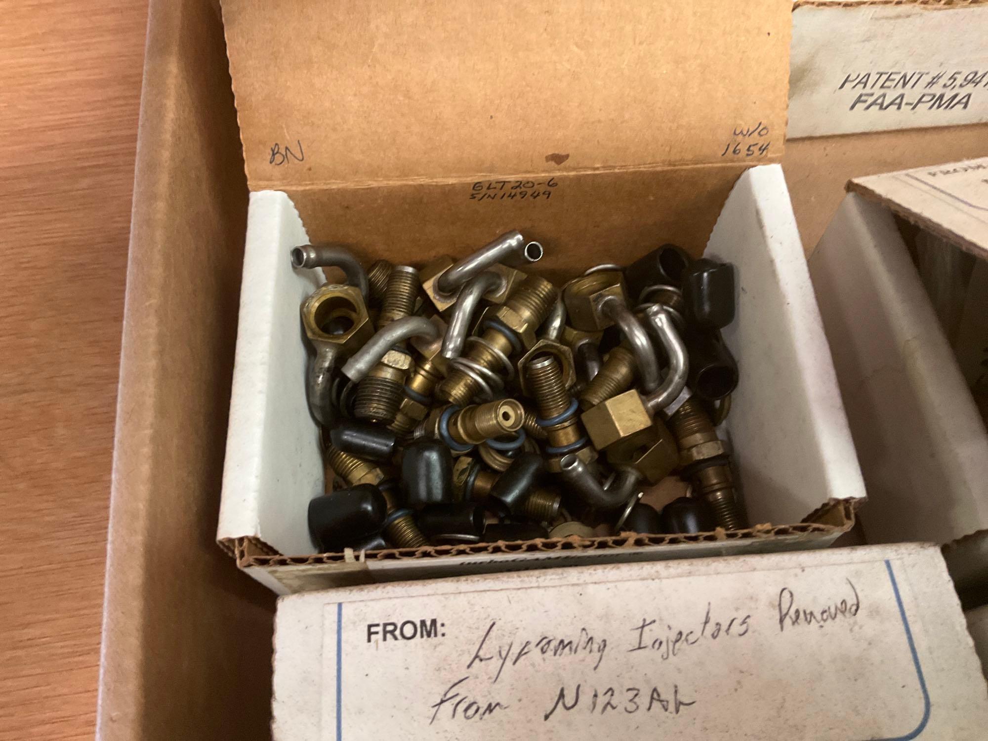 USED FUEL INJECTION NOZZLES, NEW EXHAUST NUTS & ENGINE LOG BOOKS