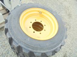 (4) New 10-16.5 SSL Tires On Yellow Rims