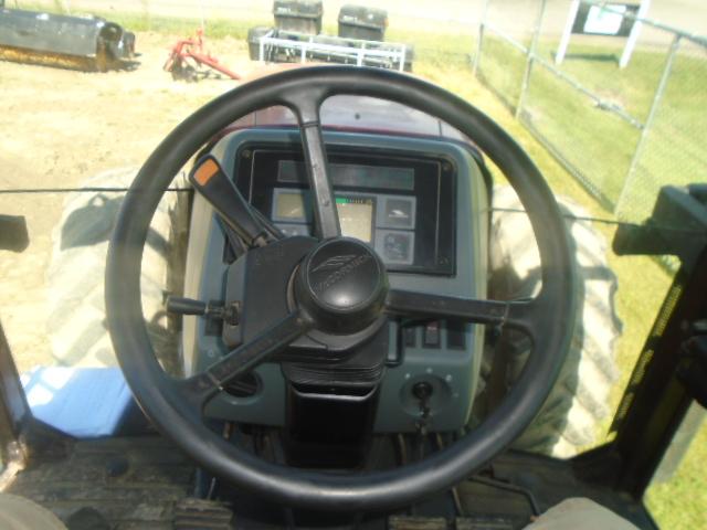 McCormick MTX155 Tractor, 4wd, Cab w/ Heat & Working AC, 16 Speed Transmiss