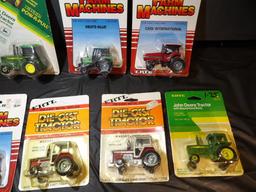 (9) Older 1/64 Tractors