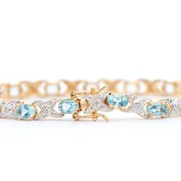 Plated 18KT Yellow Gold 9.00ctw Blue Topaz and Diamond Bracelet