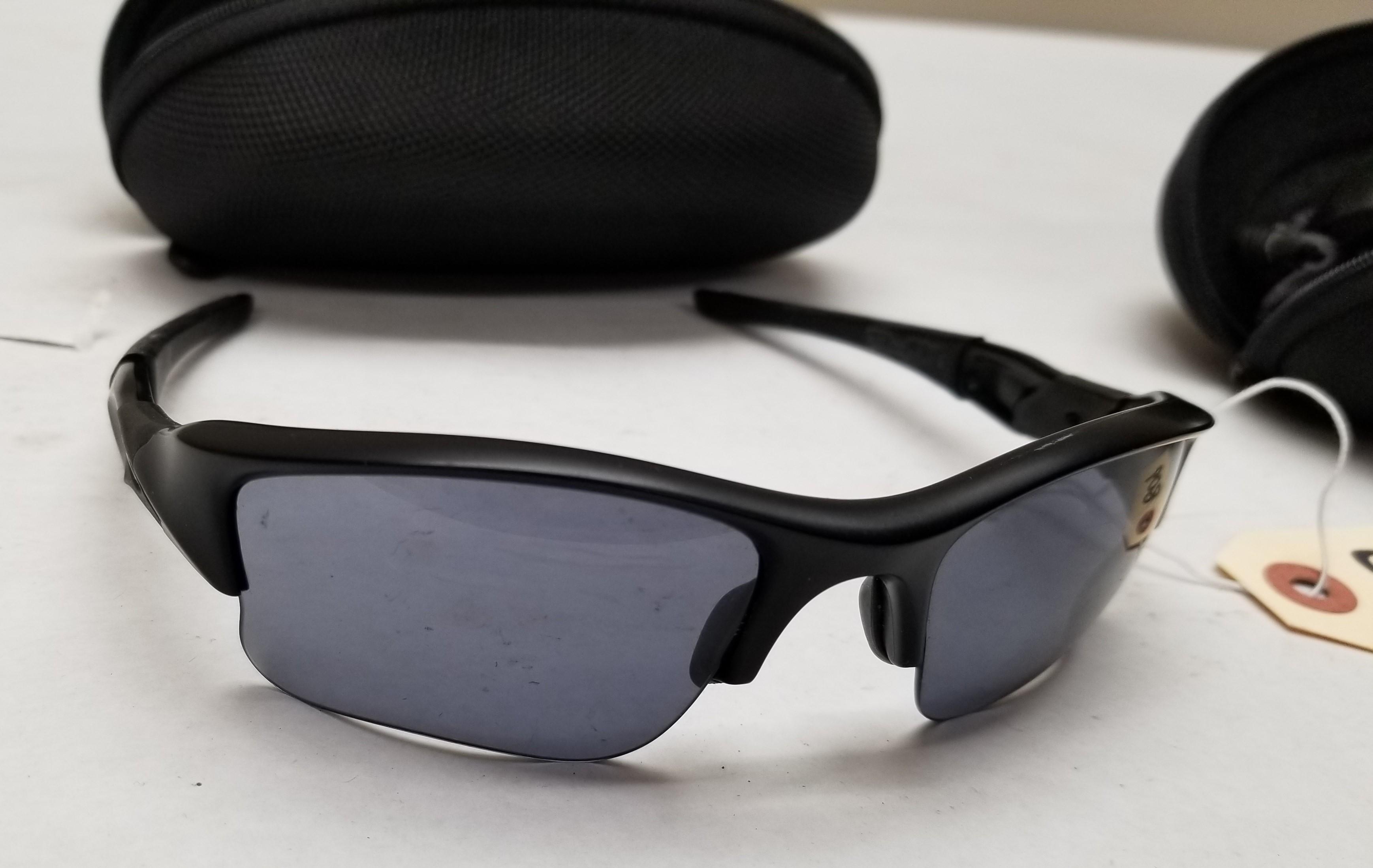 (2) Pairs Of Used Oakley Flak Jacket Sunglasses