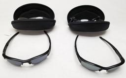 (2) Pairs Of Used Oakley Flak Jacket Sunglasses