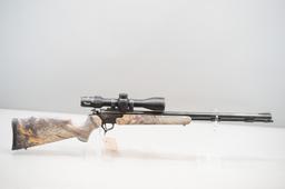 (R) Thompson Center Encore 209x50 Magnum Rifle